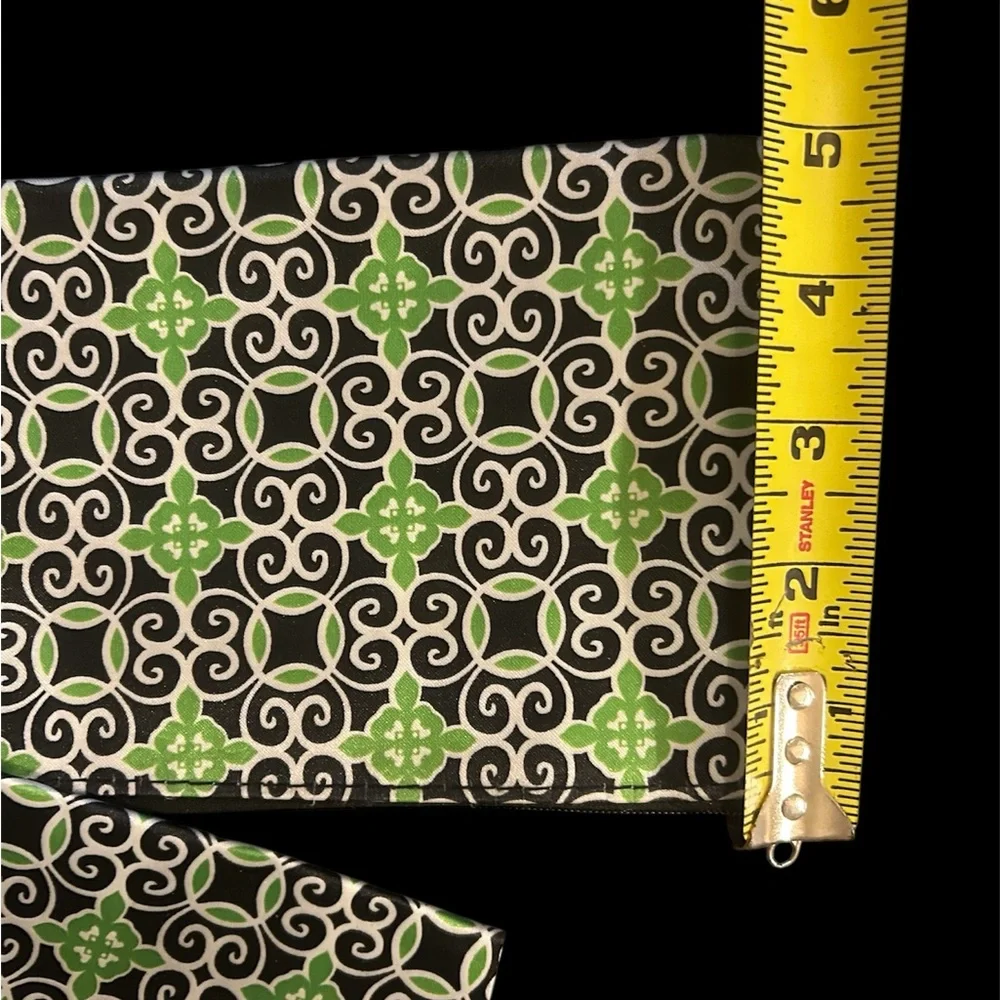 Sassy & Chic cosmetic bags featuring a green, black, and white geometric tile